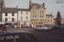 Old businesses in Hexham Market Place, approximately 1979