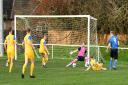 Ryton & Crawcrook Albion centre forward Aaron Costelloe has a close range effort saved by the outstretched leg of Jarrow keeper Jak Wells