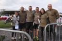 Caked in mud: Harriet Wanless, Steven Charlton, Paul Armstrong, Richard Ostell, Kimi Armstrong and Gary Hall.
