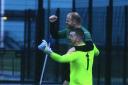 Wallington legend John Paxton celebrates with keeper Aaron Carr after scoring the winning penalty in the Northumberland FA Benevolent Bowl semi-final against Ponteland United