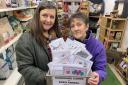 Eden Animal Rescue Trustee and fundraising volunteer, Jennie Whitfield, with owner of Appleby Pet Shop, Suzanne Jones