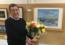 Carl Stewart won the coveted Rose Bowl this year with his stunning painting of Cemaes Bay in Wales