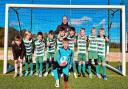 Hexham Barca Football Team donning their new kits