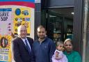Cllr Alan Sharp with Ram and his family outside the new shop