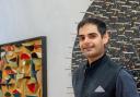 Muhammad Shaan, at his exhibition at the Queen's Hall