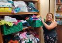 Rosie Gilchrist with donated items at Hexham Children and Baby Bank.