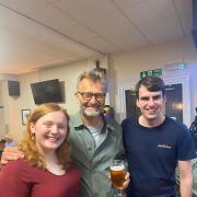 Husband and wife committee team Andrew and Tanya Stanton with Hugh Dennis