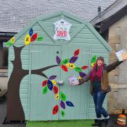 Author Monique Scott at the first school's reading shed
