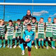 Hexham Barca Football Team donning their new kits