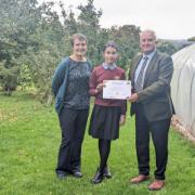L-R Dr Meryl Batchelder, Subject Lead for Science at Corbridge Middle School, Anna Pocock, competition winner and Glen Sanderson, Northumberland County Council Leader and Cabinet Member for Climate Change