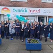 Staff and local councillors at the opening of the new Seaside Travel outlet in Prudhoe