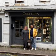Obscuria owners Laura and Steven Brownsteele with shop dog Penny outside the business on Market Street in Hexham