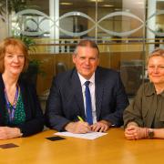 Left to right: Jane Walker, headteacher of Northumberland County Council’s Virtual School, John Johnston, Bernicia chief executive and Jenny Allinson, Bernicia director of corporate governance, signing the covenant
