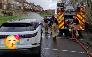 Fire crew washing cars for charity