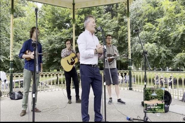 Mayor Derek Kennedy introduces The Often Herd at the Bandstand Sessions