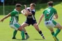 Acomb’s Matthew Ferguson, pictured (centre) in action for Scotland U19, is now running fitness sessions.