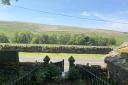 The chapel up for sale with views across the Pennines