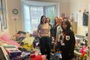 Katy and her helpers delivering the presents to the centres