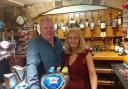 The owners of the Anchor Inn, Gavin and Karen Reay, welcome voters into their pub.