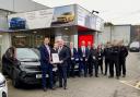General manager Gary Bracken receiving the award from James Allred, customer experience manager for Vauxhall Motors