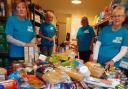 Volunteers with donations at a Northumberland foodbank