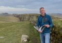 Geologist and author Ian Jackson at Steel Rigg with the Whin Sill in the background