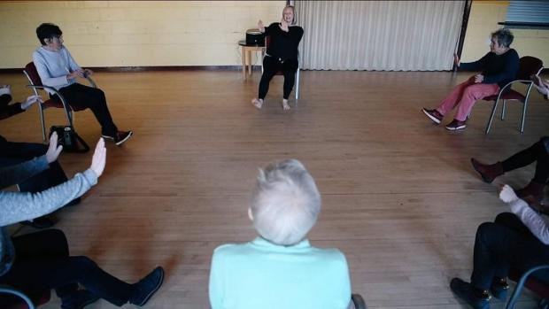 Hexham Courant: The 'Movement for your Mind' class involves seated to standing dance-based movement. Picture: Claire Batey.