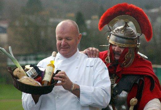 Hexham Courant: CHEF: Celebrity chef Terry Miller, officially opening the Hadrian’s Wall Country Trade Fair at Wentworth Leisure Centre, with ‘Marcus Aufidius Maximus’, Steve Richardson. Image: Stuart Outterside