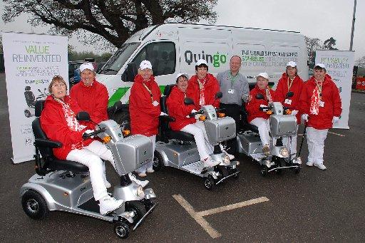 Hexham Courant: WHEELIE: The Scooter Formation Team completed the length of Hadrian's Wall on mobility scooters. Image: Hexham Courant