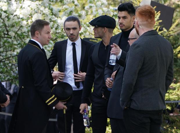 Hexham Courant: The members of The Wanted (left to right) Max George, Jay McGuiness, Siva Kaneswaran and Nathan Sykes (partially hidden) arrive for the funeral of The Wanted star Tom Parker. (PA)