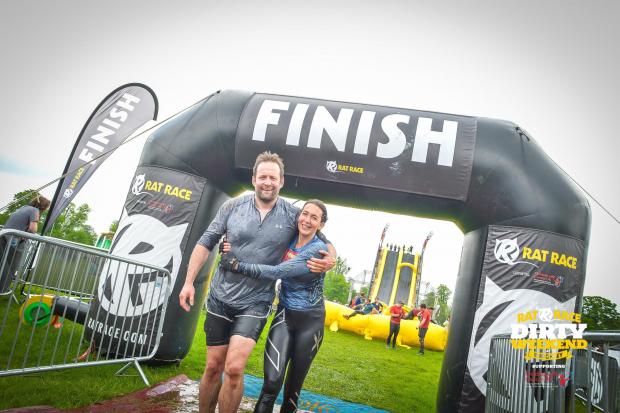 SUCCESS: Gary Middleton at the finish line with his friend Hannah.