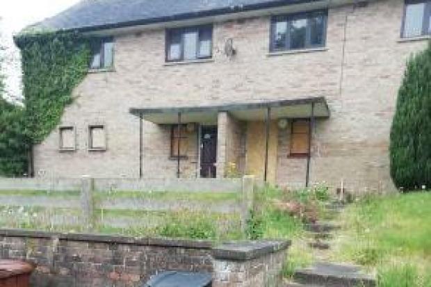 Boarded up windows and overgrown gardens at Fairfield in Hexham.