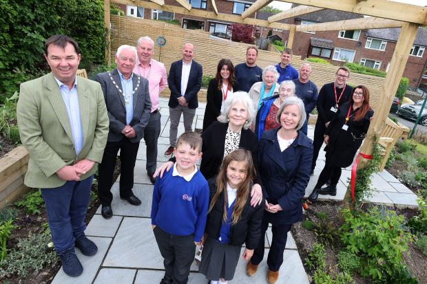 Hexham Courant: COMMUNITY: Guy Opperman MP with Councillor Byran Futers, Mayor of Prudhoe, Councillor Gordon Stewart, Colleagues from Karbon Homes, representatives from JIFT Home and Garden Improvements, residents at The Manors and pupils from Adderlane Academy. Image: Karbon Homes