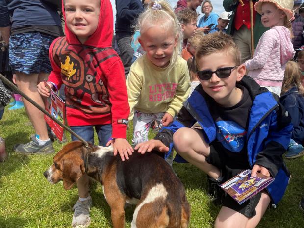 Hexham Courant: Louis, Imogen and George enjoyed meeting the Beagles at the Northumberland County Show.