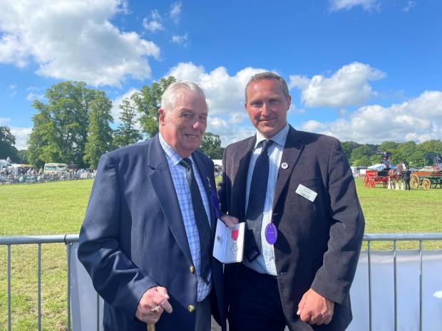 Hexham Courant: Former president of the show, Harry Mole MBE, with his successor David Carr