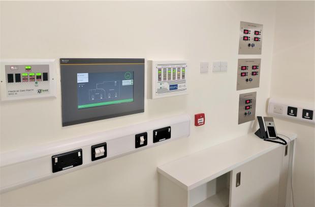 Hexham Courant: A touchscreen CP915 nurse station alarm panel (left)