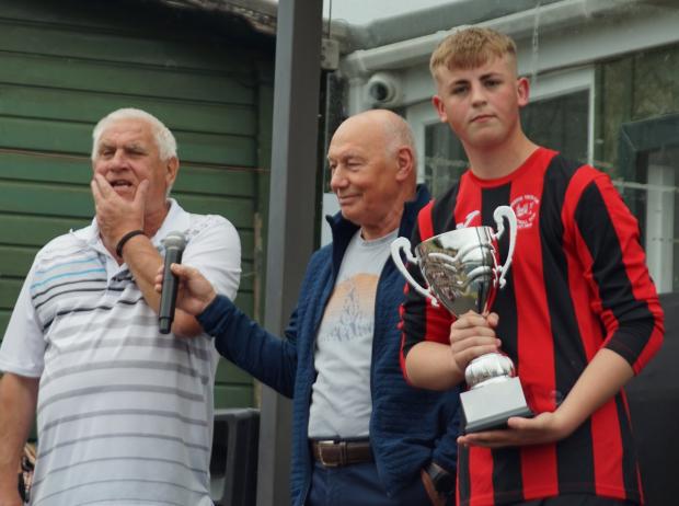 Hexham Courant: Organiser Wilton Holmes, ex-NUFC and West Ham player Bryan "Pop" Robson and Ian Lowery's son Jamie. Picture: Dave Vause