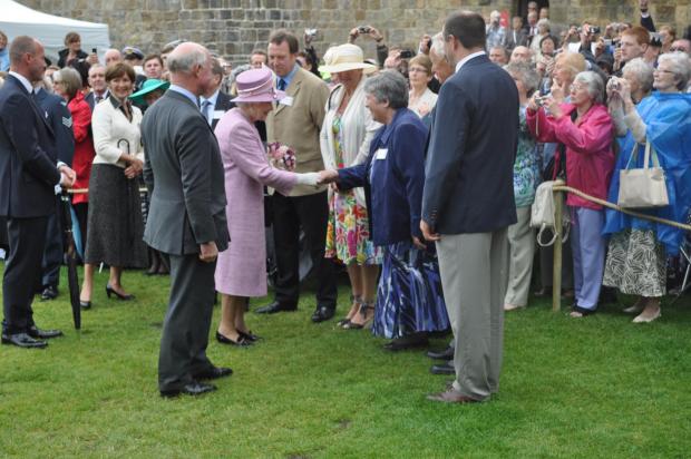 Hexham Courant: Pauline being presented to the Queen after receiving the Jubilee Medal from British Rowing for her contribution to Junior Rowing.