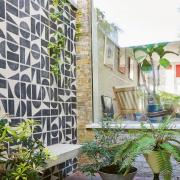 Undated Handout Photo of a contemporary Mediterranean garden using graphic tiles. See PA Feature GARDENING Small. Picture credit should read: Jason Ingram/Mitchell Beazley/PA. WARNING: This picture must only be used to accompany PA Feature GARDENING