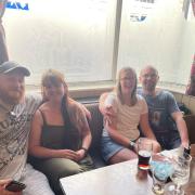 Danny Beale, Vicci Moore, Annah Swann, and Darren Pick (L-R) enjoying the game at The Grapes, Hexham.