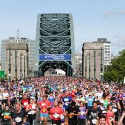 Thousands of people cross the Tyne Bridge at the beginning of the Great North Run. Picture: TOM BANKS.