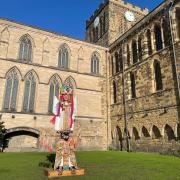The Mexican Totem pole outside the Hexham Abbey.
