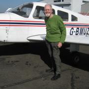 FLYING HIGH: John M Gill on his 90th birthday, just before a flying lesson at Newcastle Aviation Academy