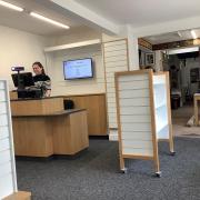 REFURBISHED: Clare Mackay, the shop manager, testing the new Electronic Point of Sale system after installation at Bellingham Heritage Centre