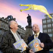 NEW LOOK: Chris Goulding (right) with  Bill Card (left) with TinselToon book.