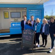 Guy Opperman and Christine Caisley with Barclays staff outside the mobile bank in Ponteland.
