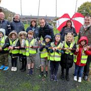(L-R) Cllr Alan Sharp, Glen Pearson of Karbon Homes, Denise Singleton, Karbon’s community connector for West Northumberland, Phil Sim, teacher, Kath Glen, Housing Manager and Guy Opperman MP, with year two pupils from Shaftoe Trust