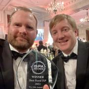 CEO Michael Lee and Chief Operating Officer Tom Rigg accept Best Rural ISP award