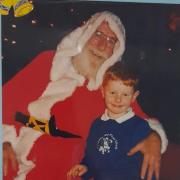 Tom Arnup as Santa with grandson Jordan
