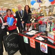 (L-R) Store Manager Michael Brown, Sheila Oliver, Trevor Cessford Mayor of Hexham who made the draw and Sam Gillchrist West Northumberland Food Bank Co-ordinator, one of the charities who will benefit from the money raised